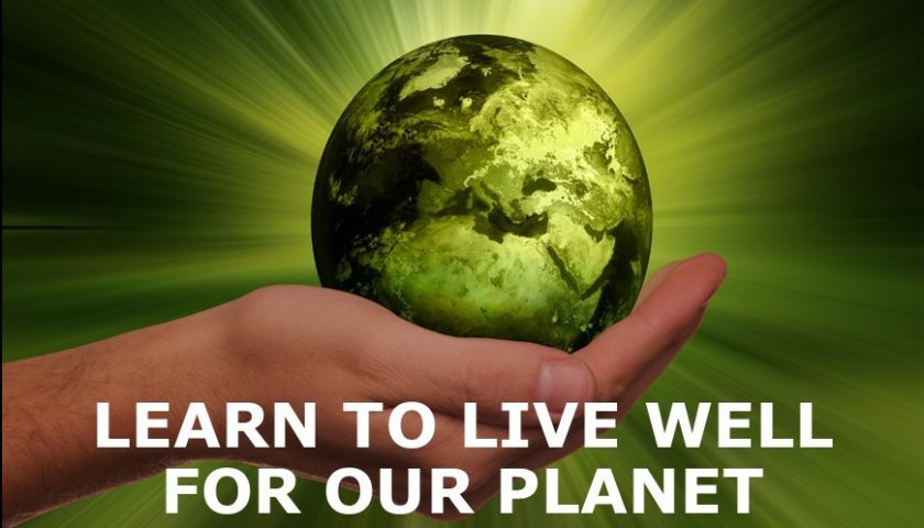 Picture of the planet with the phrase "Learn to Live Well for the planet"