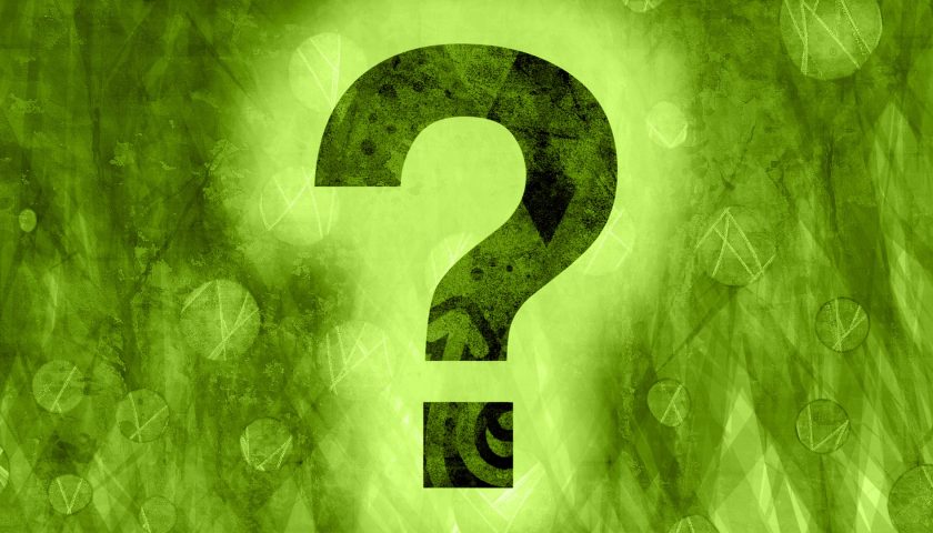 A picture of a question mark against a green background
