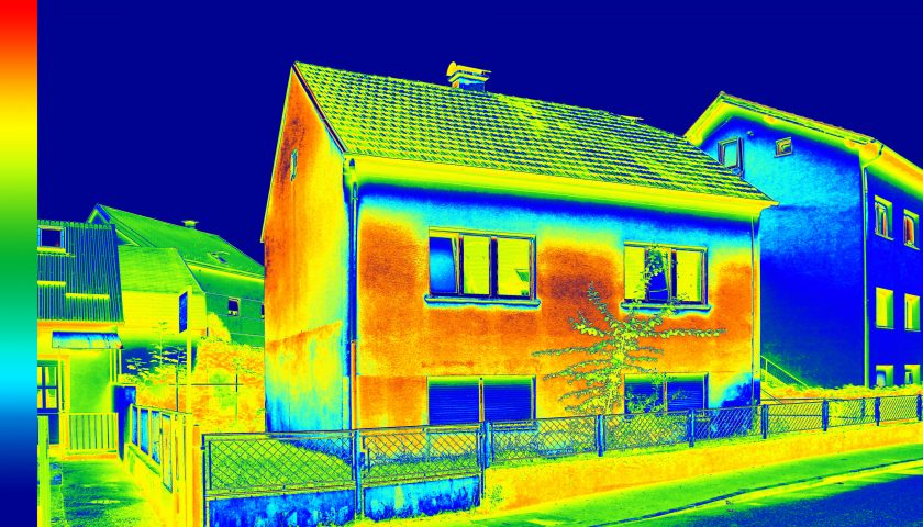Thermovision view of house showing where heat is wasted.